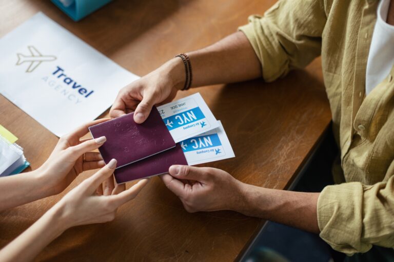 Top view of plane tickets in travel agency.